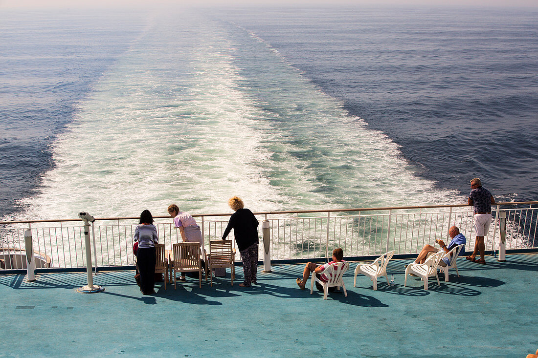 Passengers on the stern of a cross channel ferry