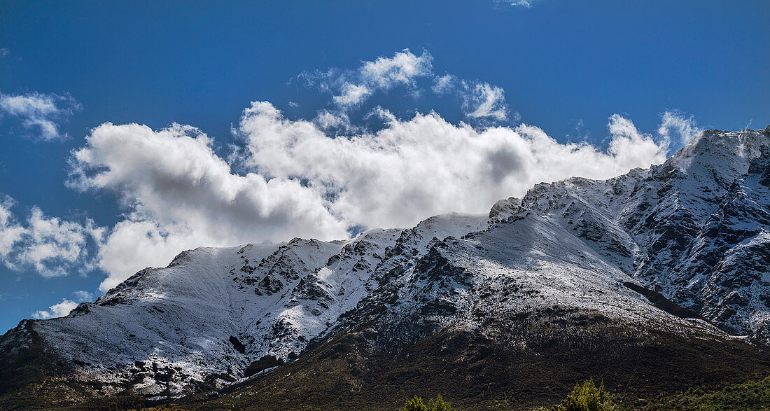 Cumulus humilis clouds forming over New Zealand mountains
