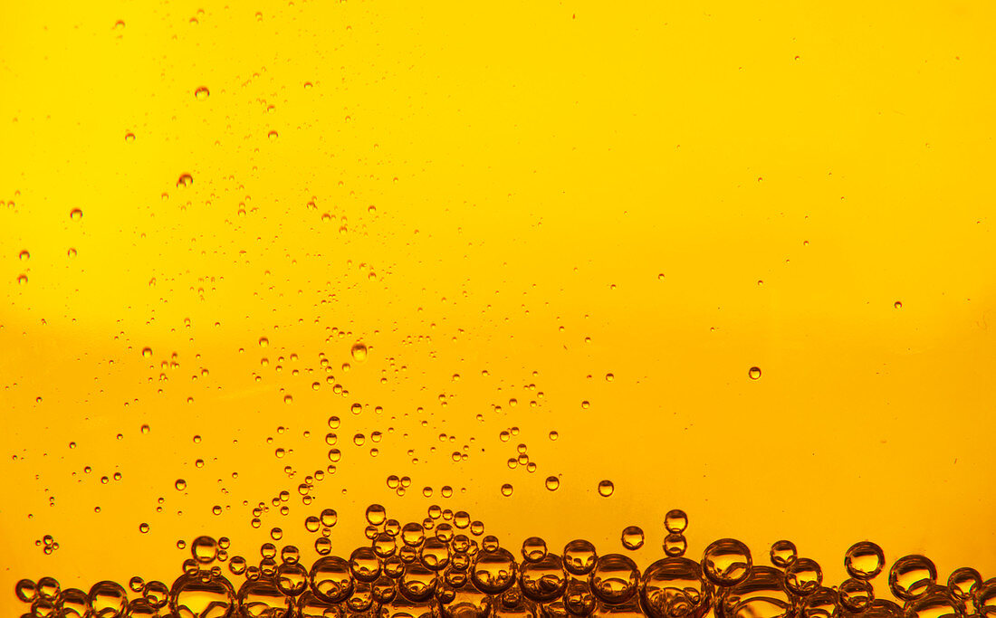 Bubbles in golden liquid