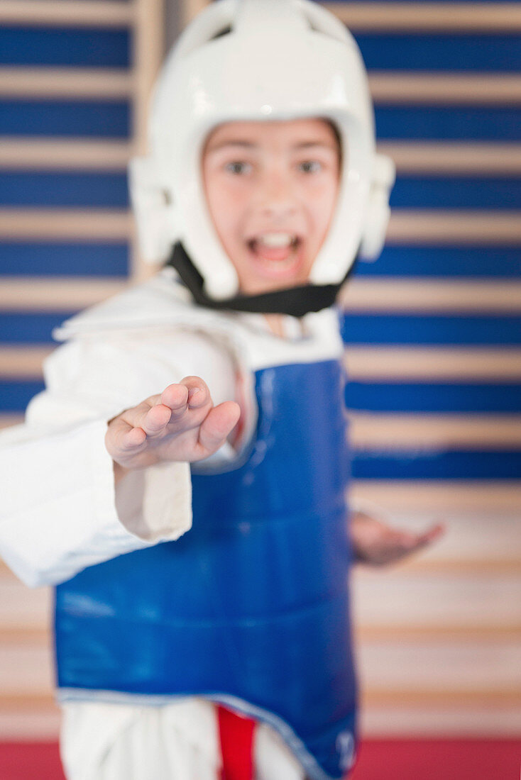 Boy in taekwondo class