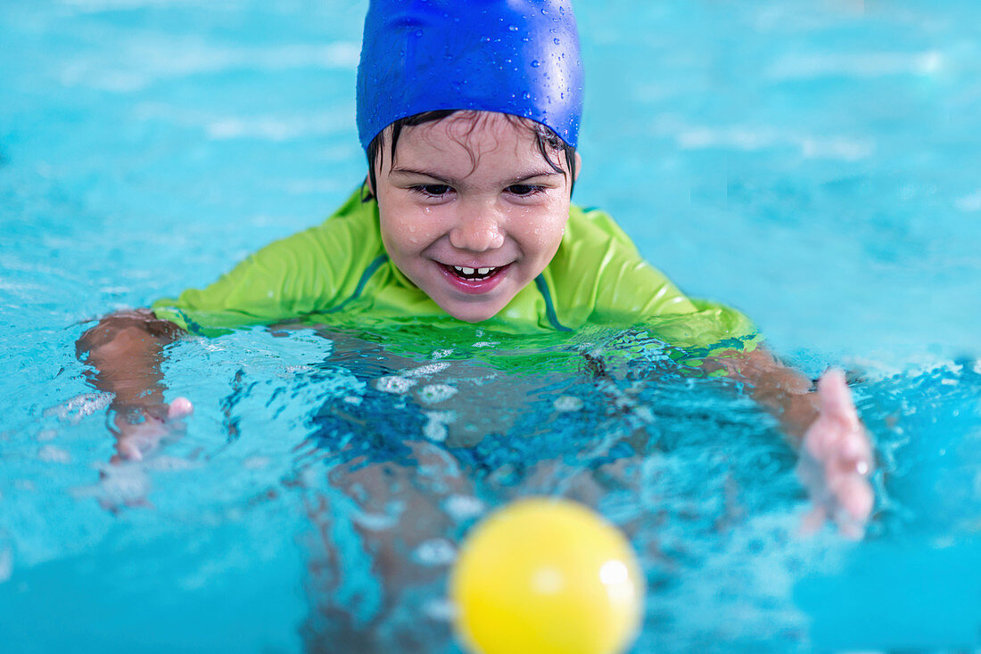 Boy in swimming pool