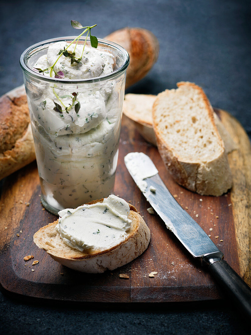 Soft cheese on slice of baguette