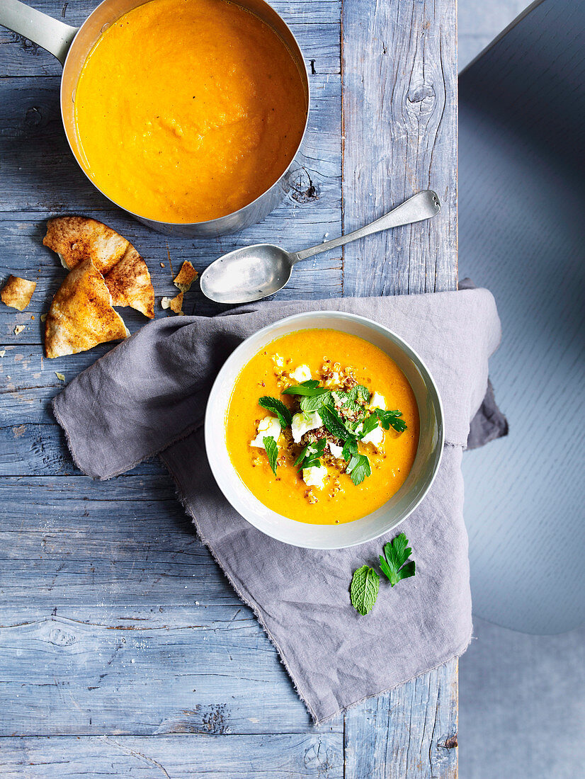 Carrot soup with feta and quinoa