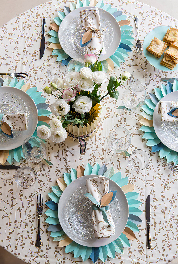 Table set with decorative paper placemats