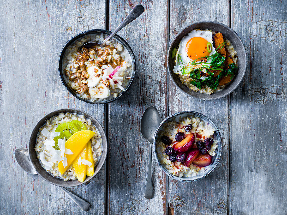 Four porridge varieties with banana and apple, spicy japanes veg, tropical coconut and lime, plum and raisin