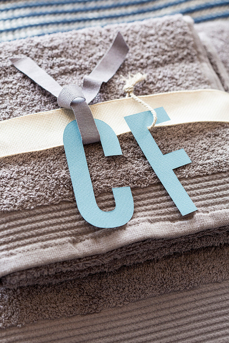 Handmade paper initials for guest towels