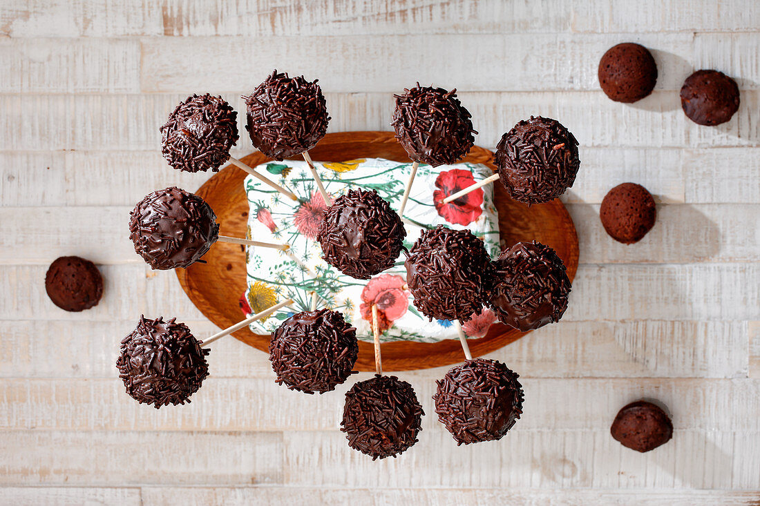 Chocolate cake pops with chocolate sprinkles