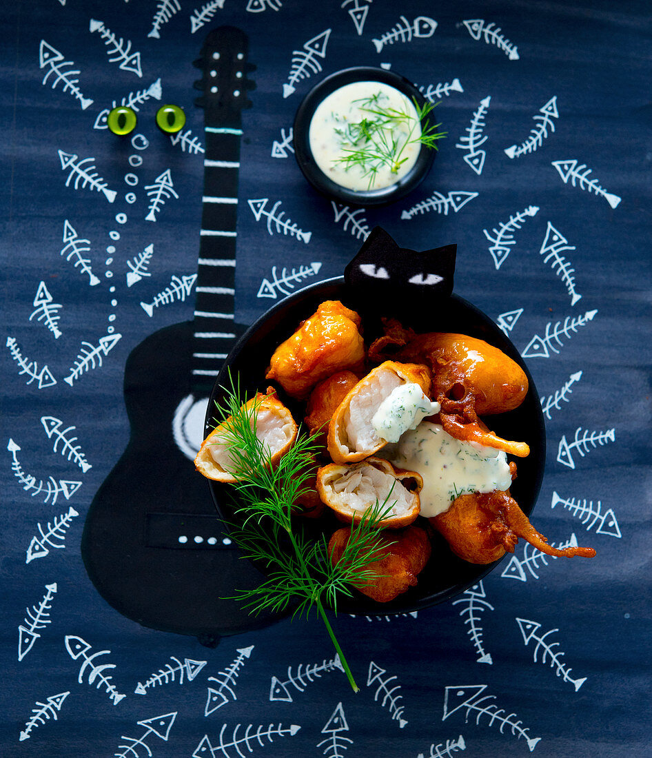 Fish nuggets with dill sauce