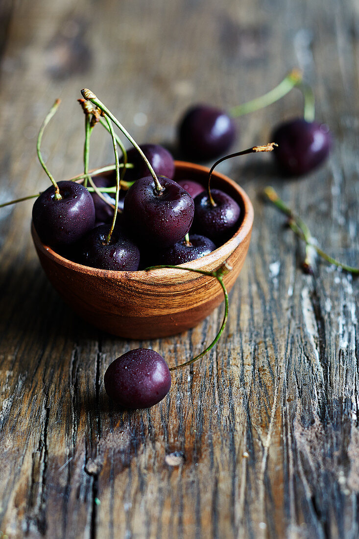 Cherries in a wooden bowl