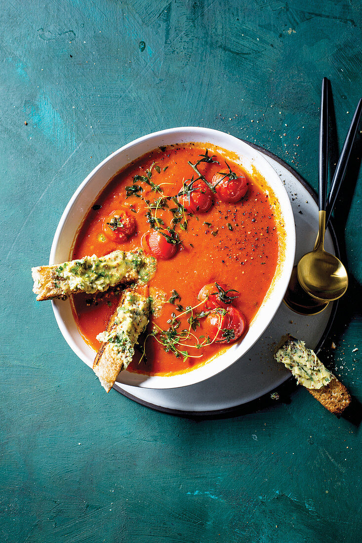 Tomatoe soup with ancohovy-butter soldiers