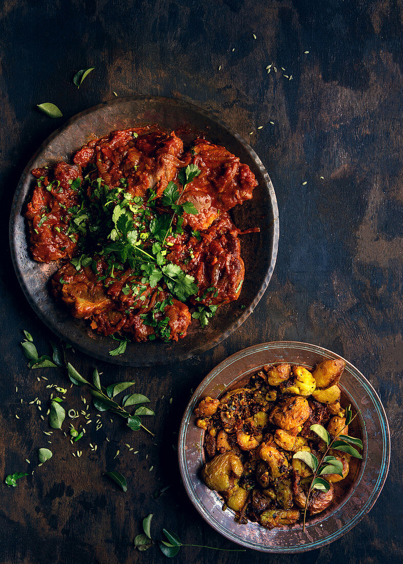 Indian pork curry with crispy spice potatoes