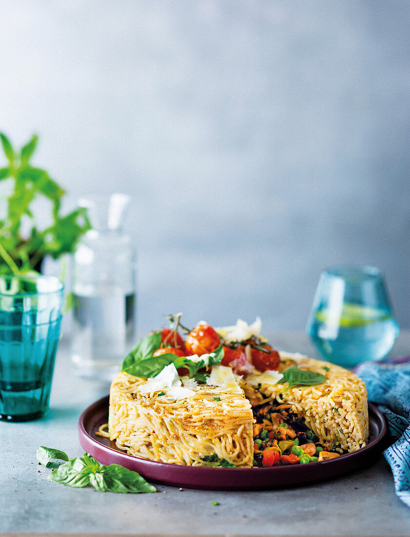 Giant spaghetti timbale with seafood filling