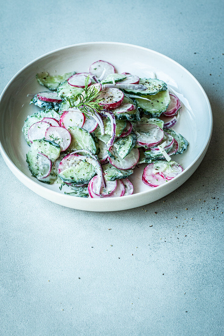 Radish and cucumber salad with sour cream