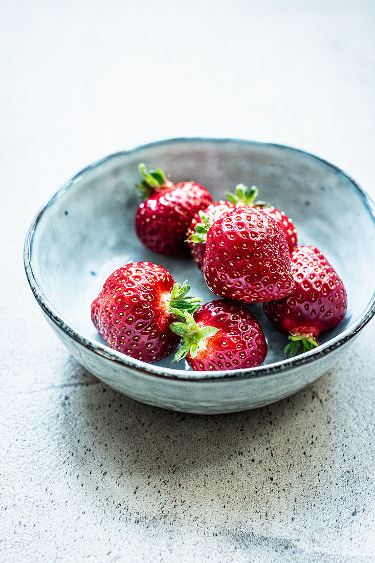 Strawberries in a ceramic bowl