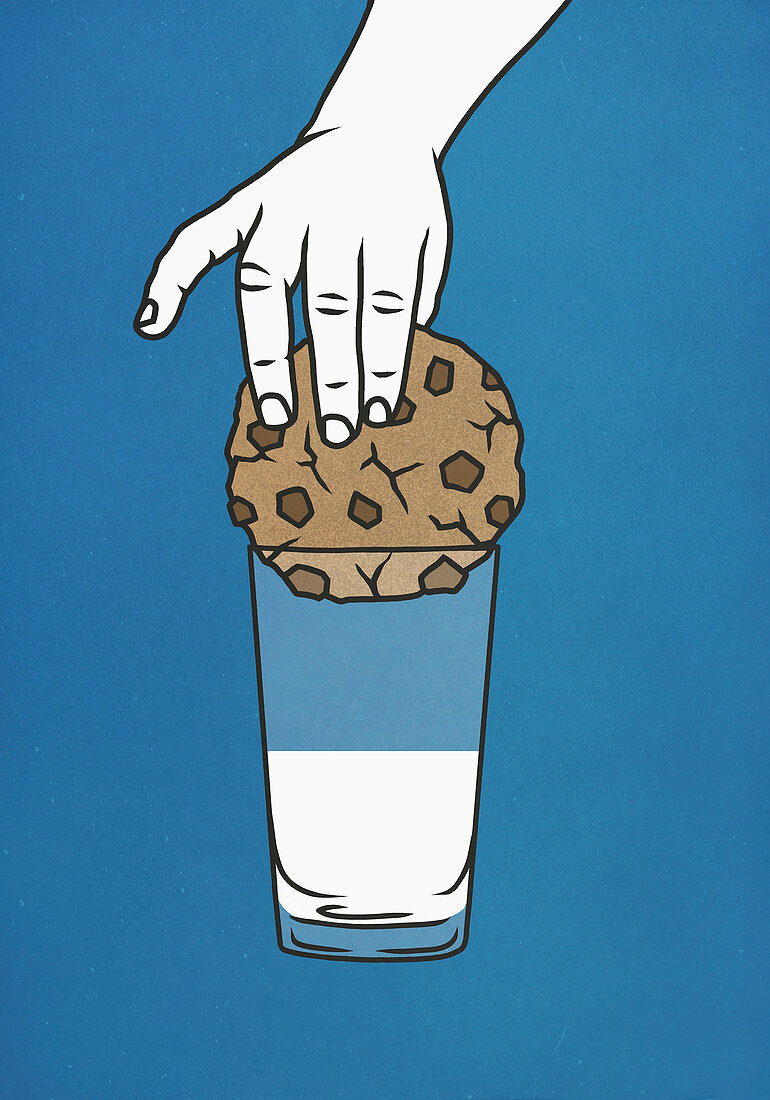 Hand trying to dip large cookie into glass of milk