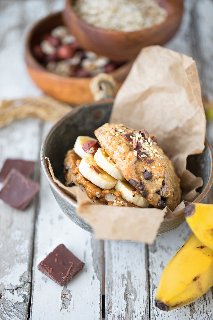 Sweet oatmeal burger with bananas and peanuts