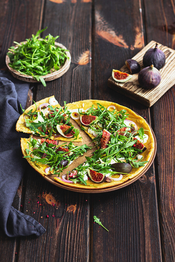 Socca pizza with figs and rocket
