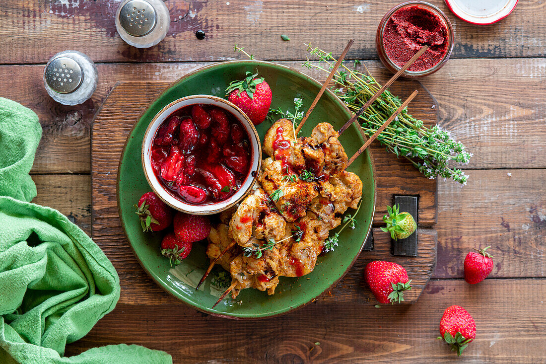 Chicken skewers with strawberry sauce