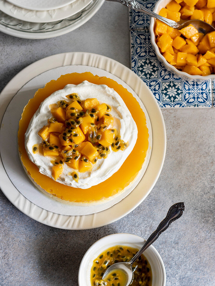 Passion Fuit Mango Cheesecake on the white plate