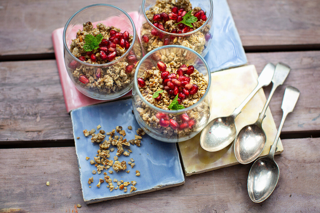 Granola with yoghurt and pomegranate seeds