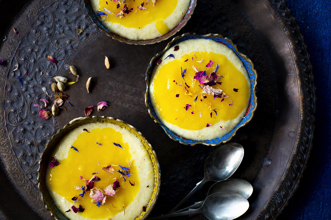 Rice pudding with mango sauce and cardamom