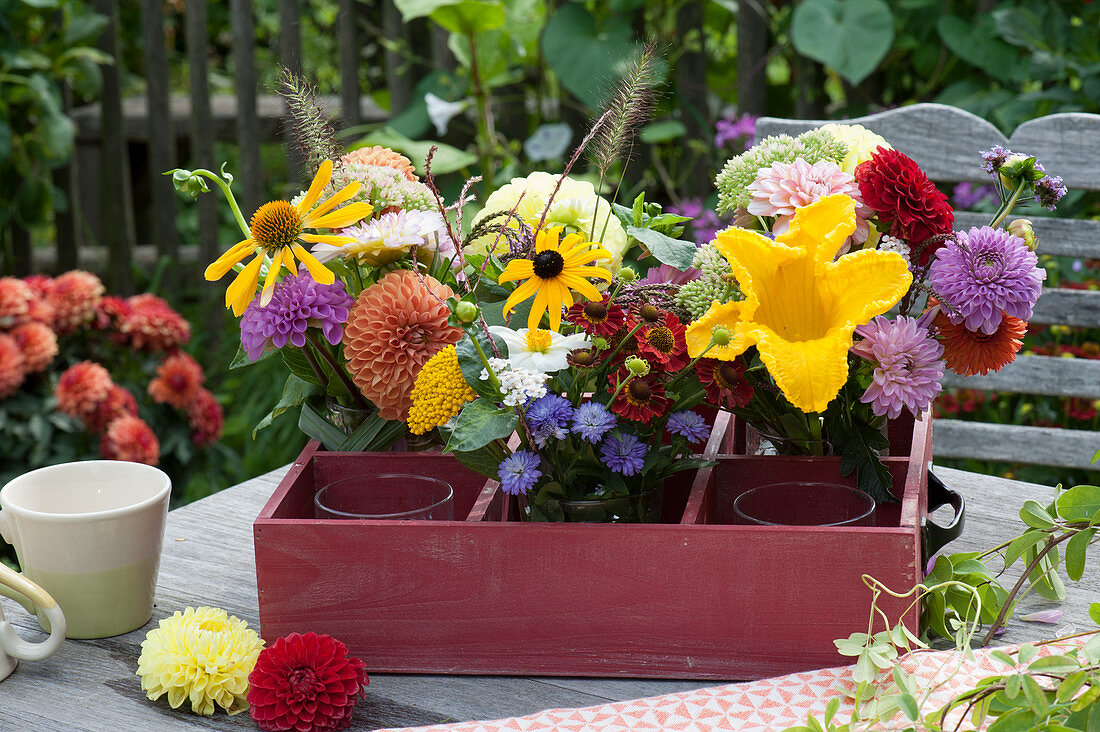 Flowers from the cottage garden: dahlias, zucchini blossoms, Helenium, Echinacea, coneflowers, sedum plant, and fountain grass