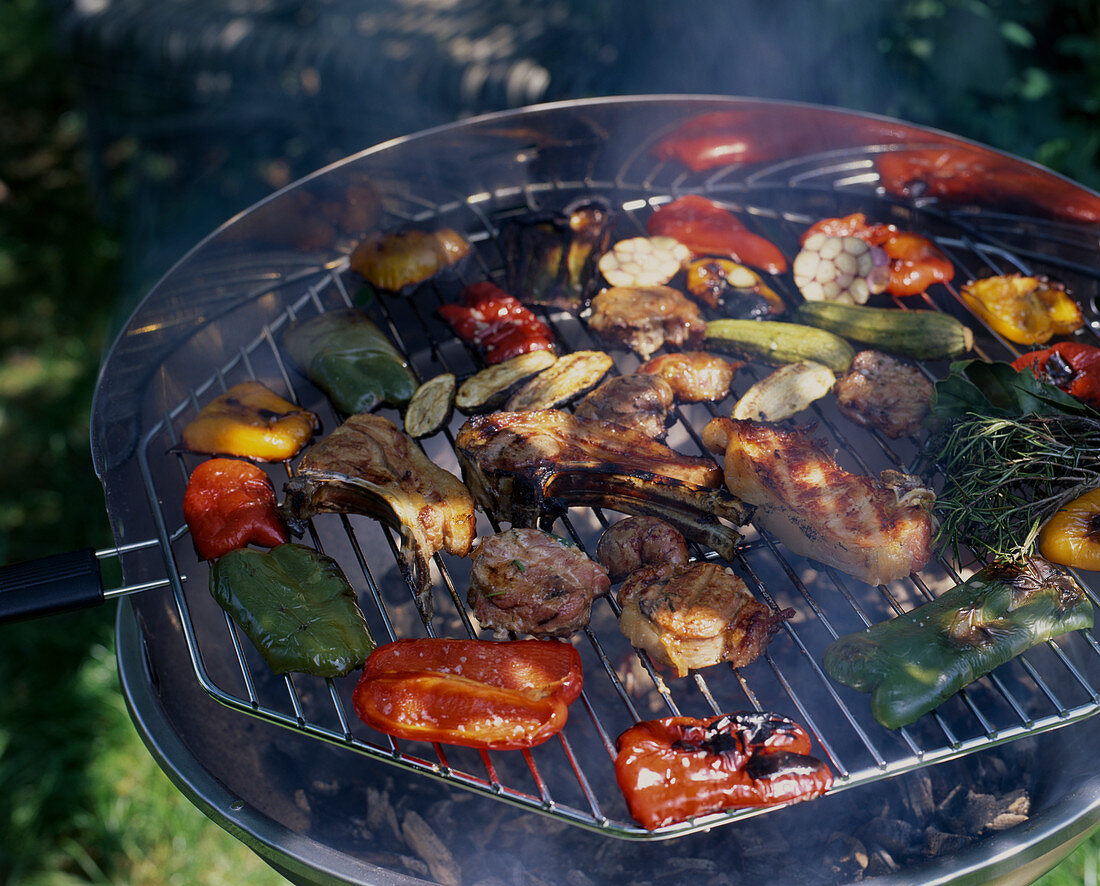 Meat and vegetables on barbecue