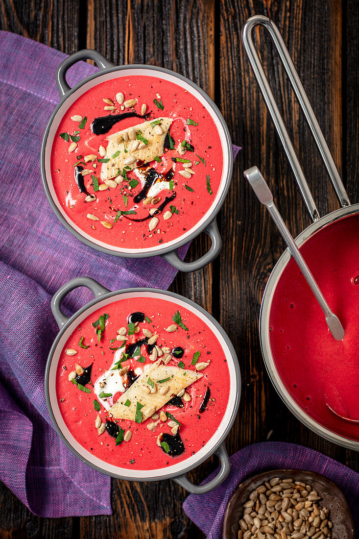Beetroot cream soup with yogurt and smoked trout