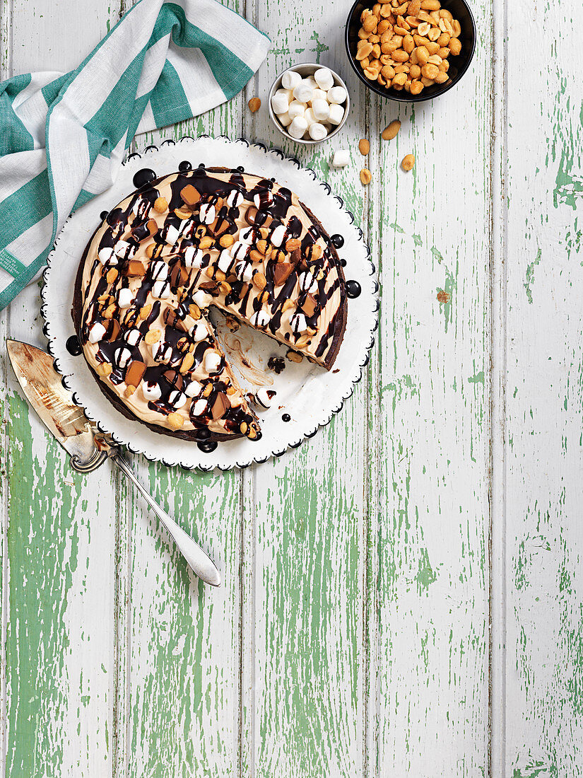 Chocolate cake with marshmallows and peanuts