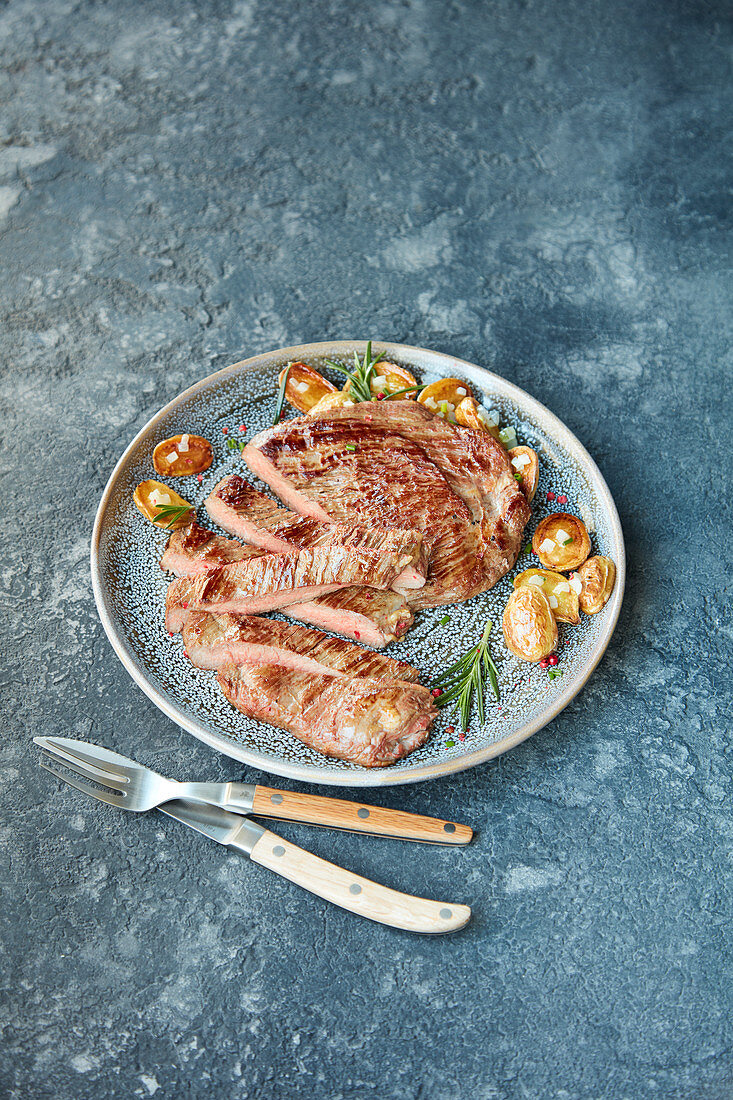 Flank steak, sliced