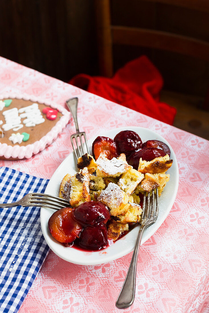Kaiserschmarrn (shredded sugared pancake from Austria) with stewed damsons