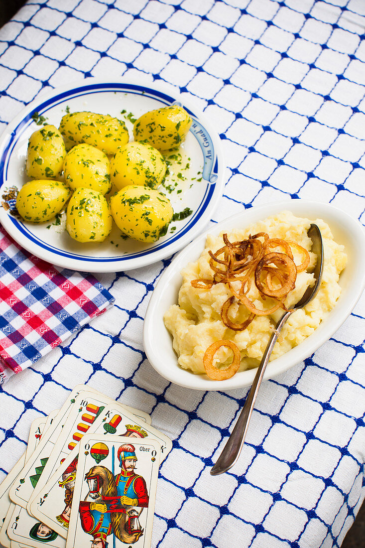 Parsley potatoes, and mashed potatoes with roasted onions