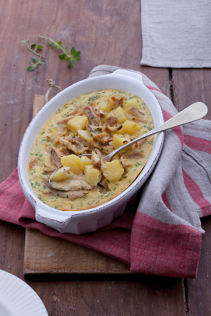 Hähnchen-Clafoutis mit Kartoffeln und Kräutern