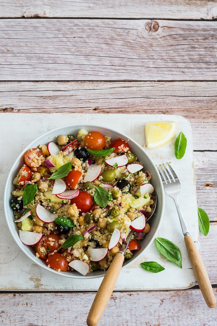 Quinoa salad with chickpeas, radishes and cherry tomatoes