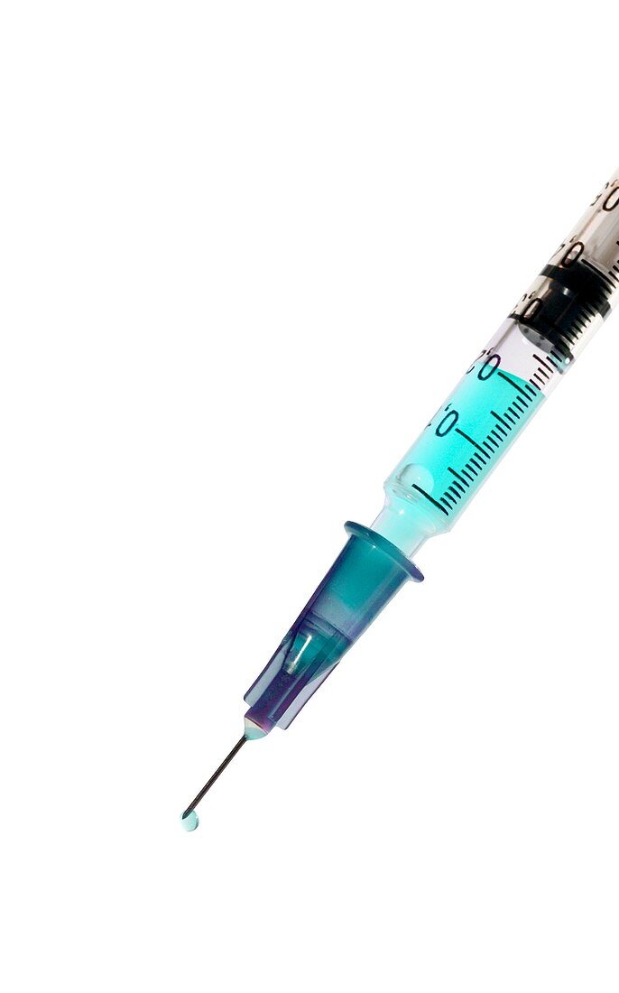Hypodermic syringe filled with colourful liquid