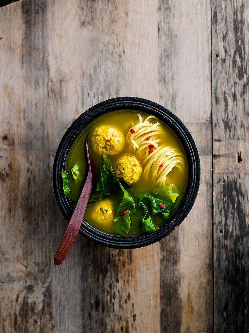 Turmeric broth with ginger chicken dumplings
