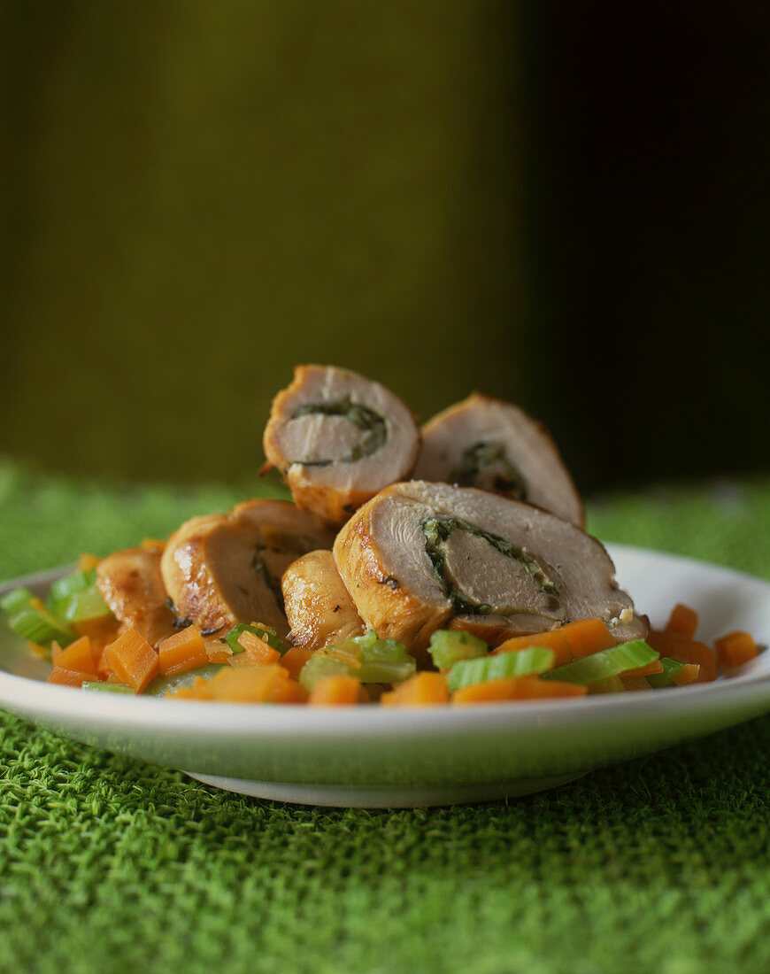 Stuffed turkey roulade with vegetables