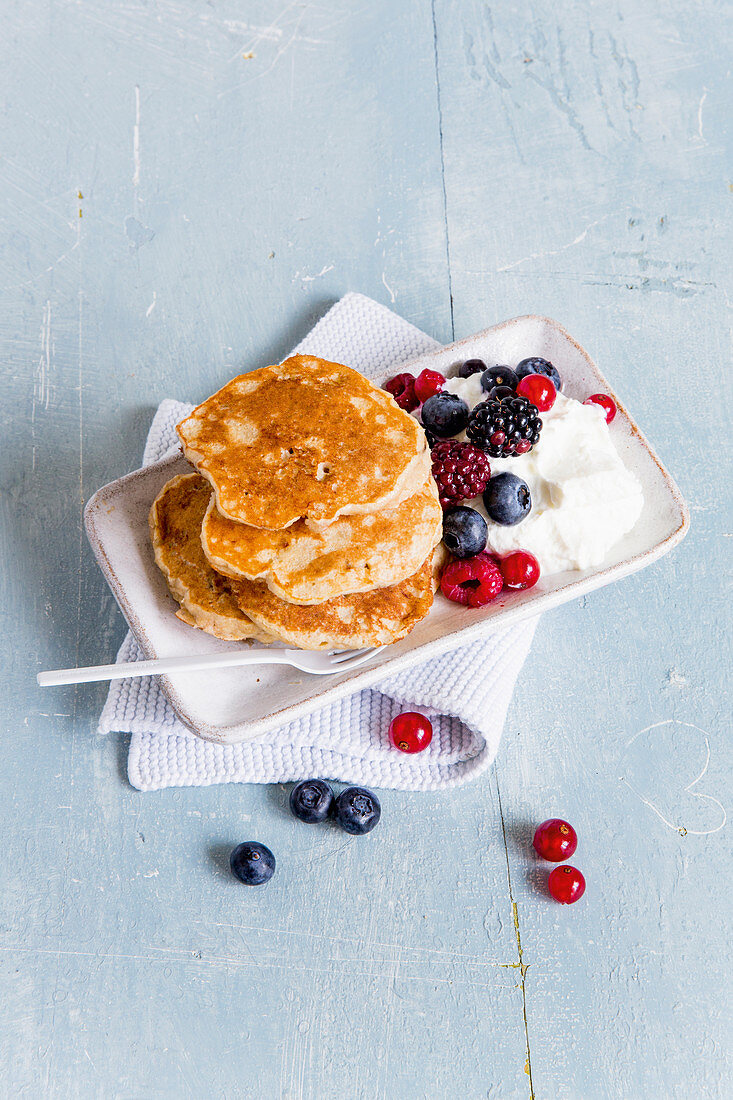 Protein pancakes served with quark and berries