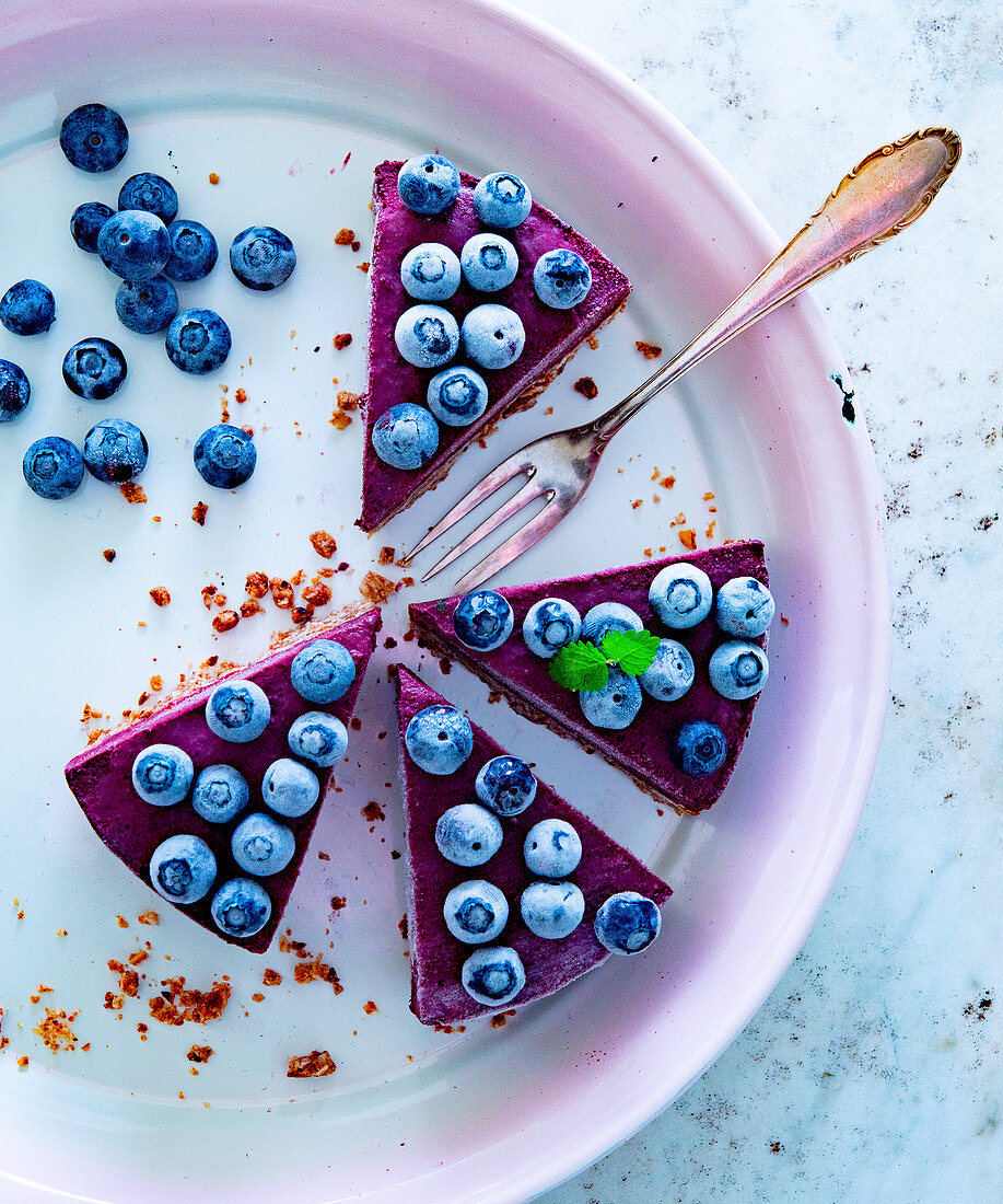 Slices of blueberry cake on a cake plate