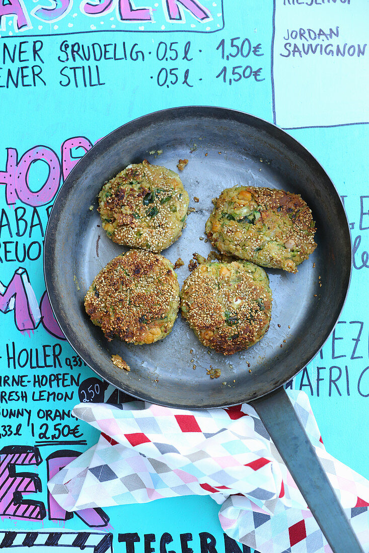 Vegetable fritters in a pan