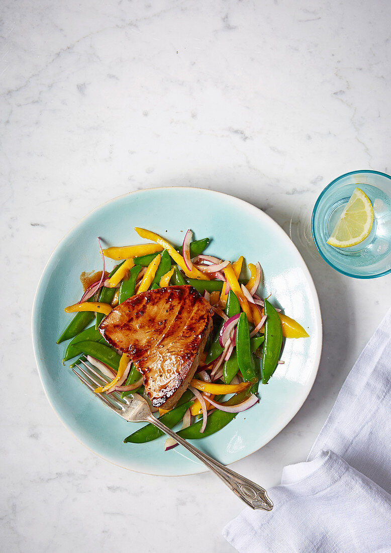 Tamarind-glazed tuna with sugar snap and mango salad