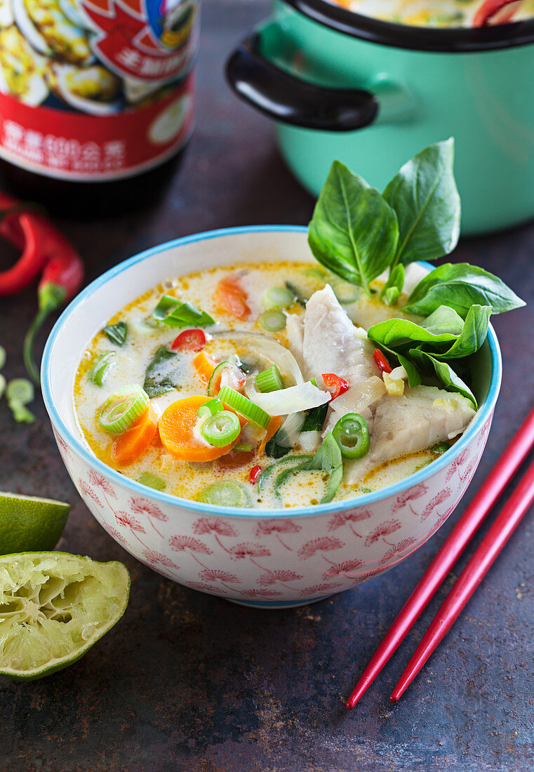 Tom kai fish soup with thaibasil, lime, leek, chili, carrots and coconnut milk