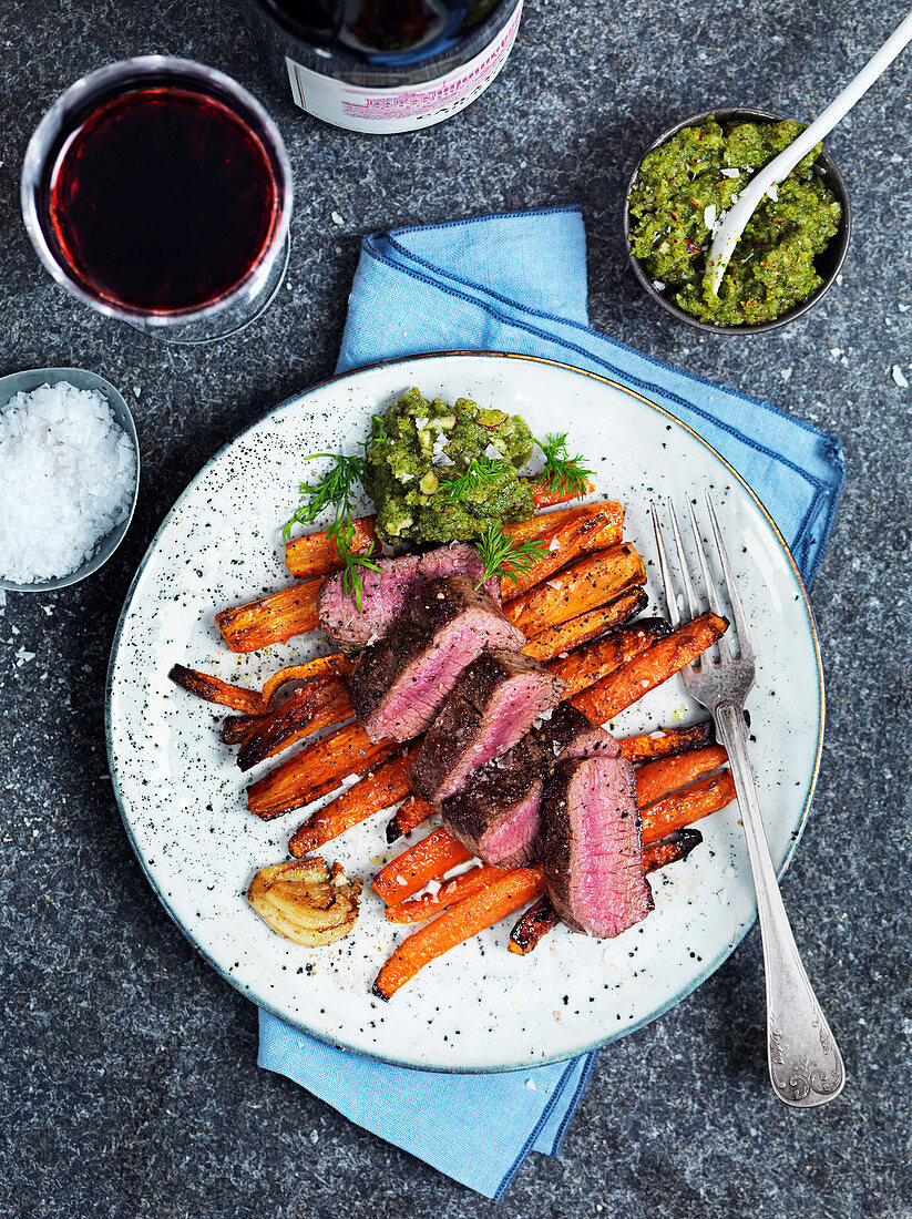 Roasted lamb with carrots and pesto