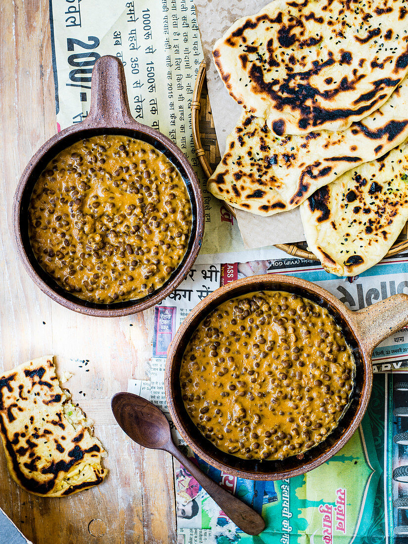 Black dal with paneer-stuffed naan