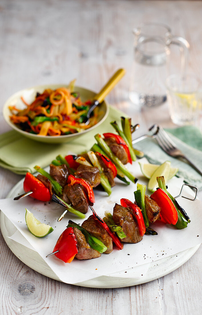 Duck skewers with red pepper and spring onions