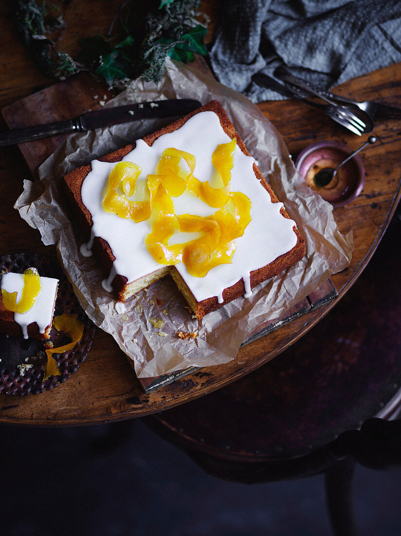 The drizzle cake with candied lemon rind and lemon glaze