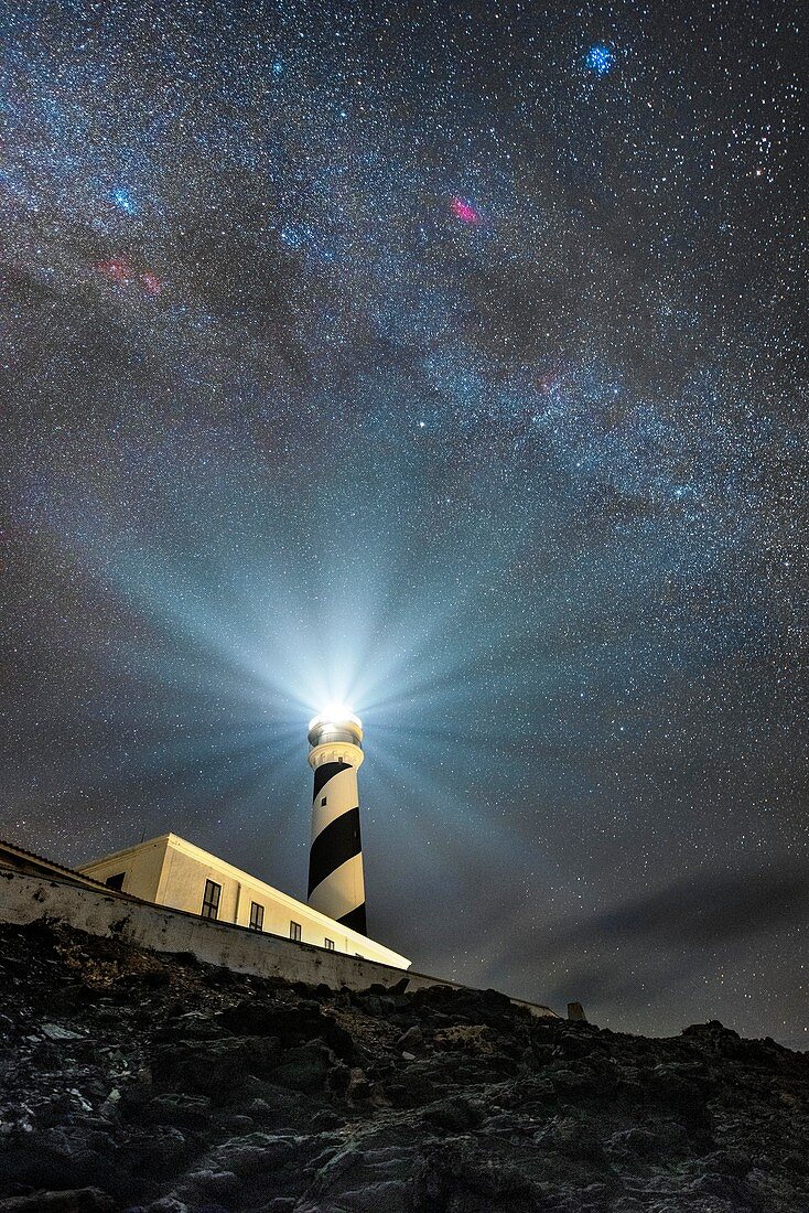 Milky Way over a lighthouse