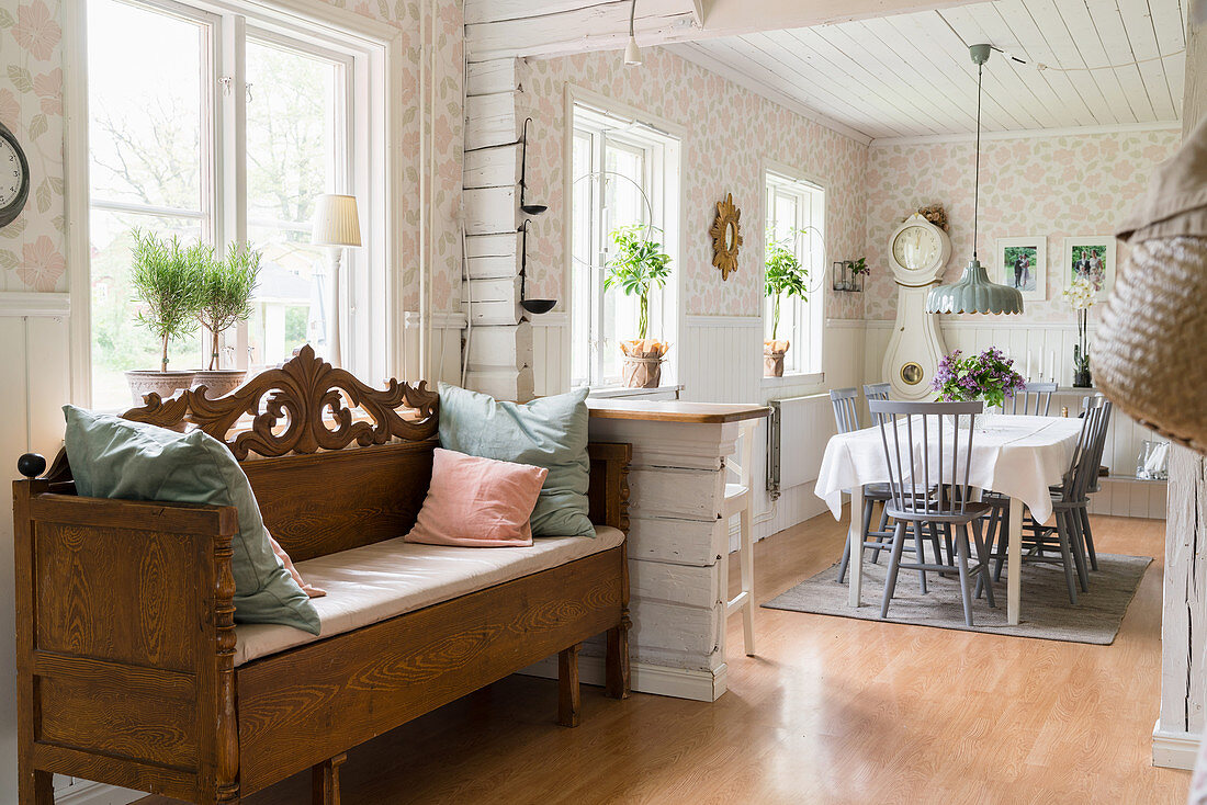 Open doorway leading from kitchen into dining room in Scandi-style interior