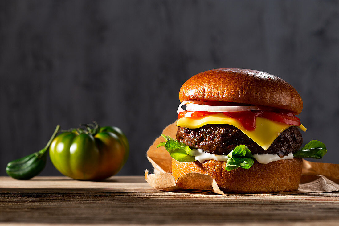 Cheeseburger with ketchup and onions