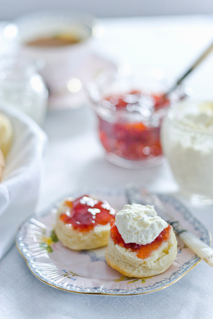 Scones with chantilly cream and strawberry jam